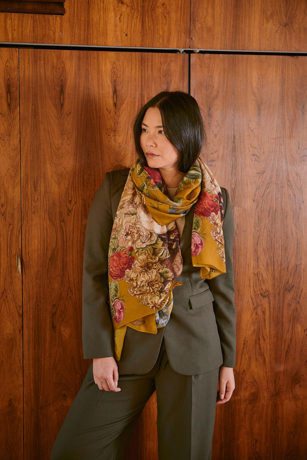 Model wearing botanical print scarf by One Hundred Stars – available at Urban Wild