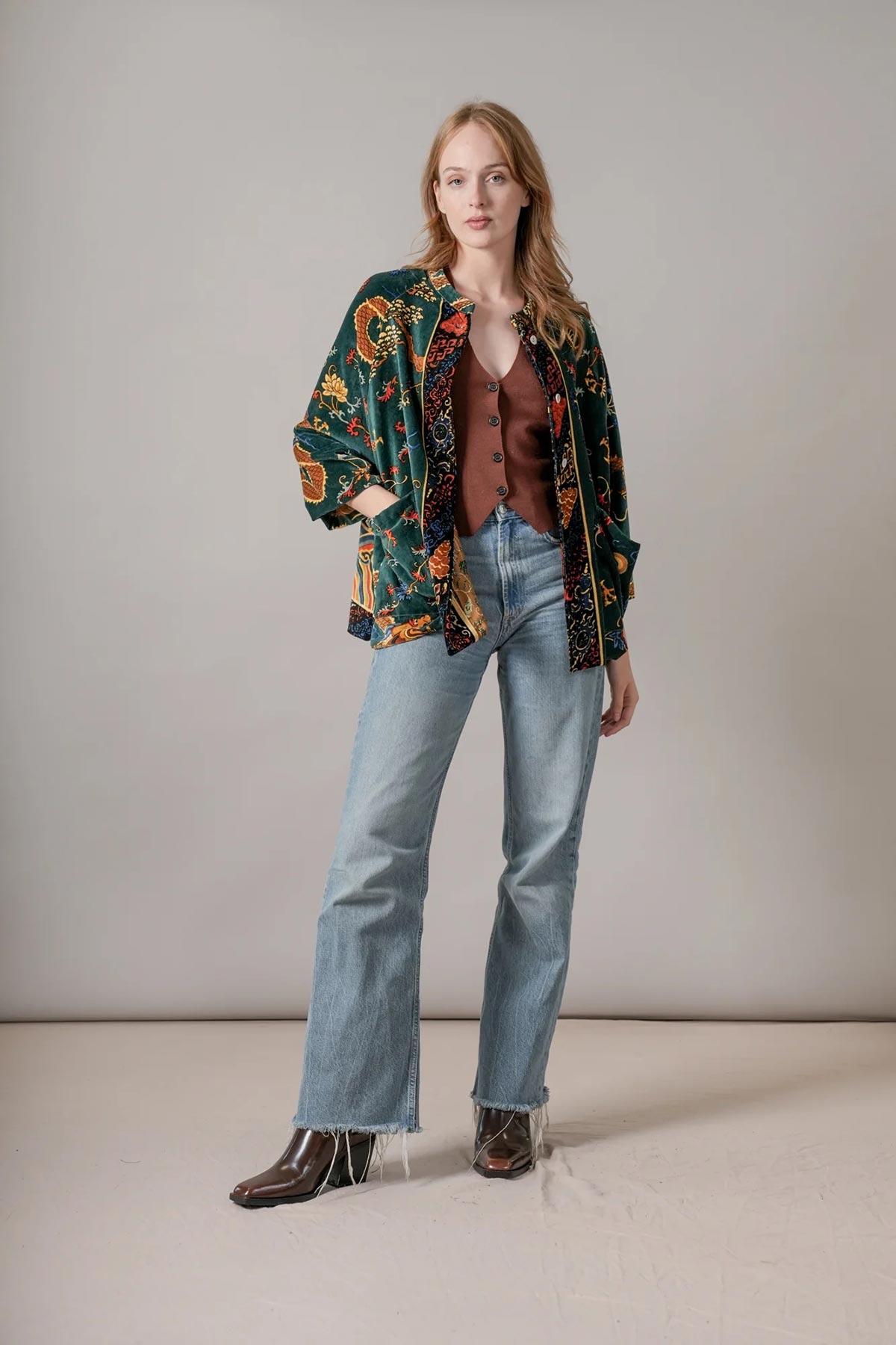 Model wearing dragon green velvet jacket print by One Hundred Stars – available at Urban Wild