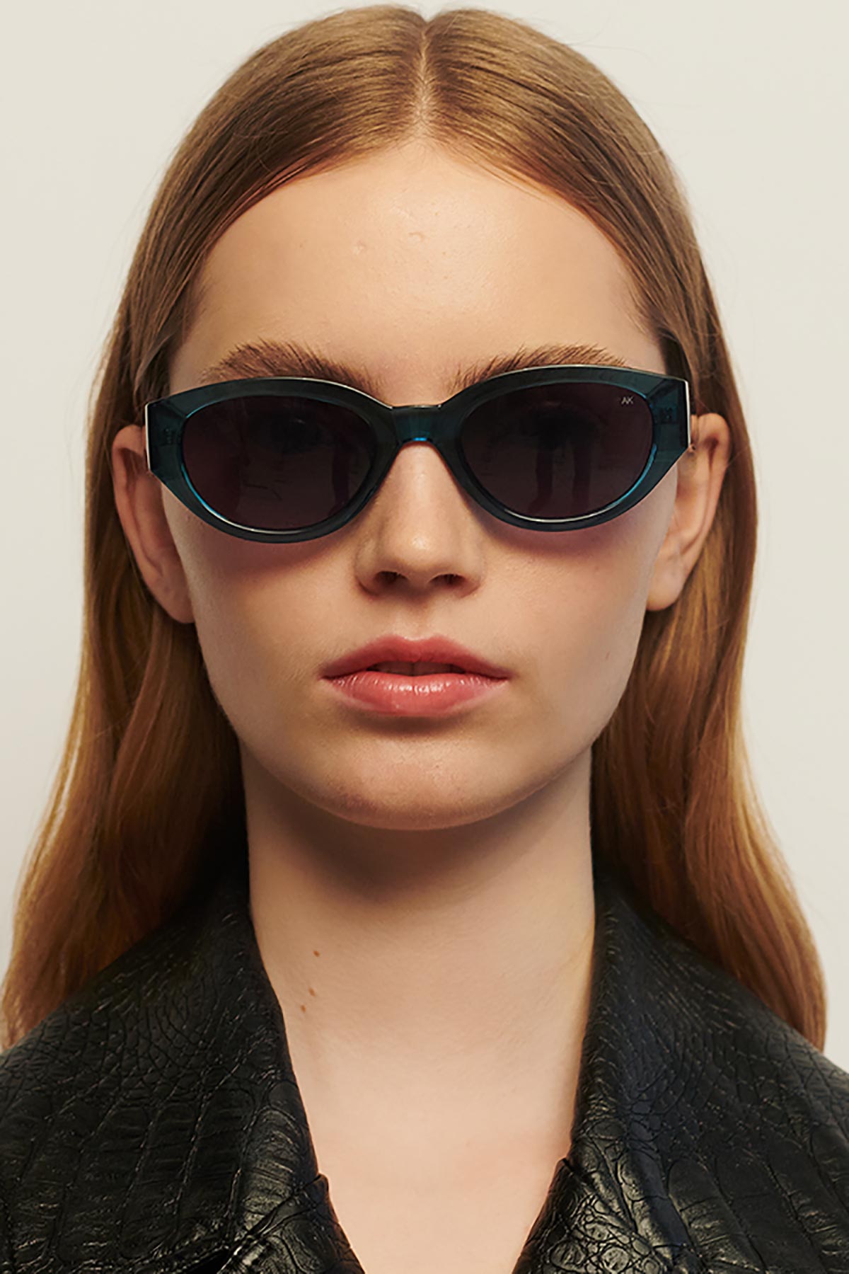 A Kjaerbede Winnie Sunglasses In Petroleum Transparent