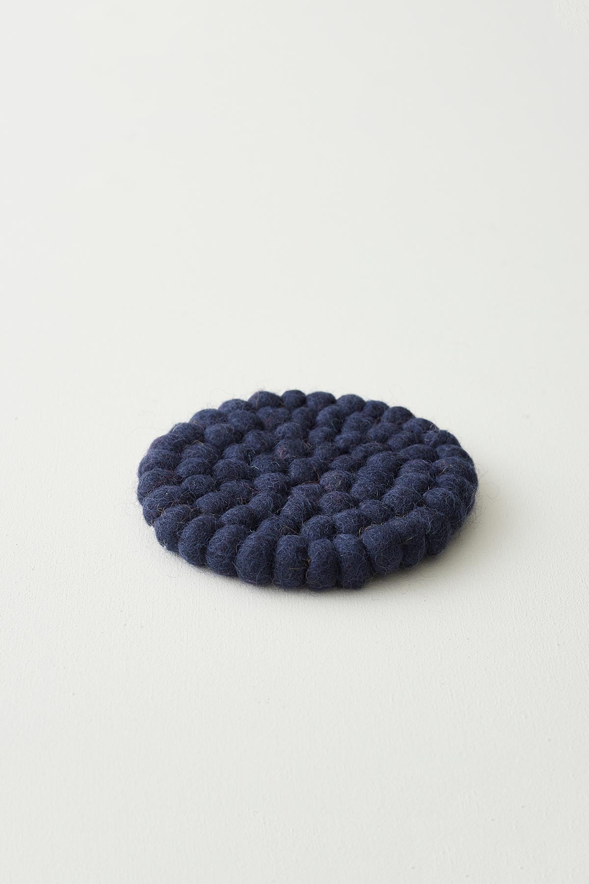 Aura Que Asik Handmade Eco Felt Ball Coaster In Navy Blue