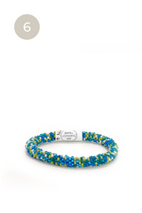 Aid Through Trade Party | Roll-On® Bracelets